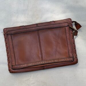 Vintage 1970s distressed leather clutch